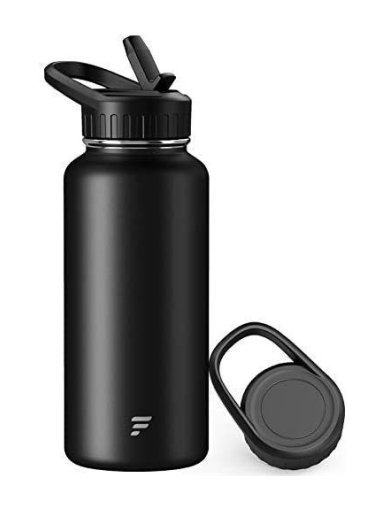 Imatge d’una ampolla negra amb la tapa a terra, sobre fons blanc.